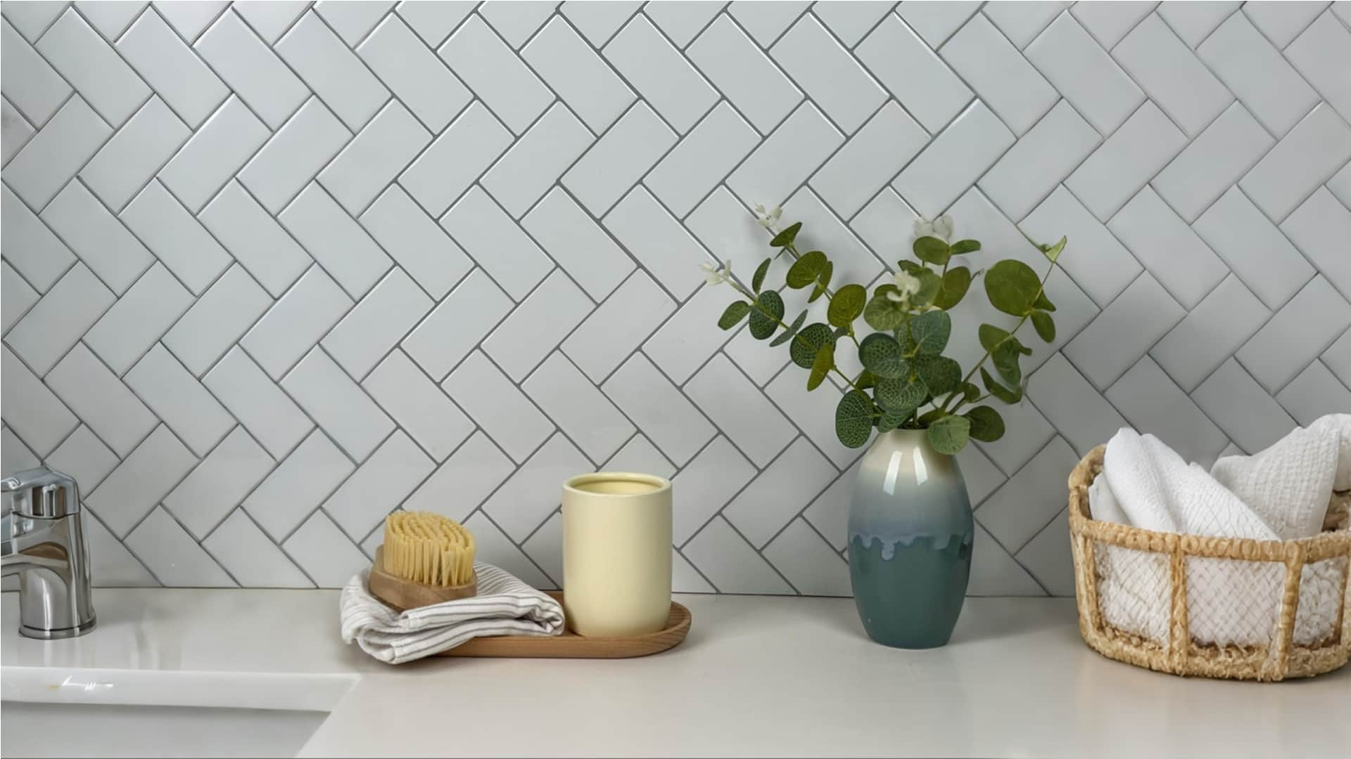 Stickwoll Peel and Stick Herringbone Tiles, featuring a classic chevron pattern with a modern twist; displayed in a stylish and functional home setting