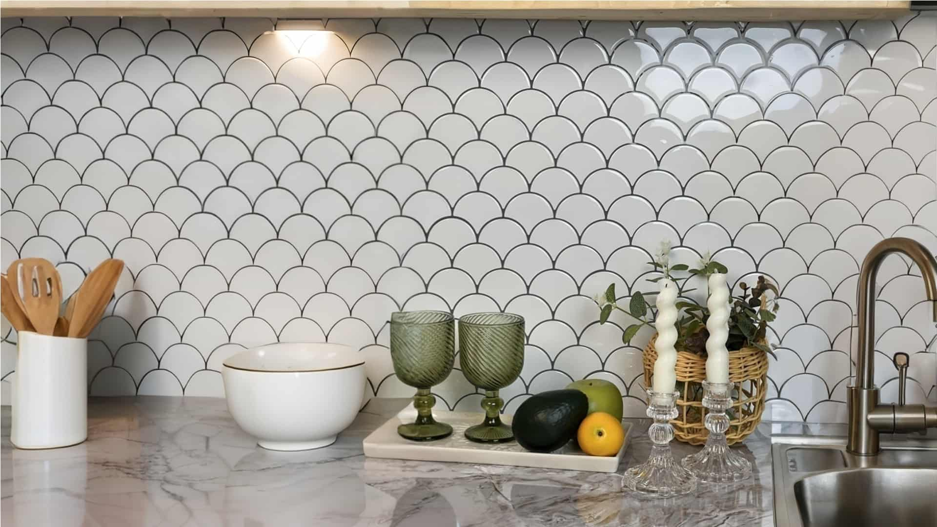 Stickwoll Peel and Stick Hexagon Tiles series showcased in a minimalist kitchen; featuring Onyx Hexagons Tiles on the wall, styled with a fruit bowl, coffee beans, and a green potted plant for a sleek and modern aesthetic