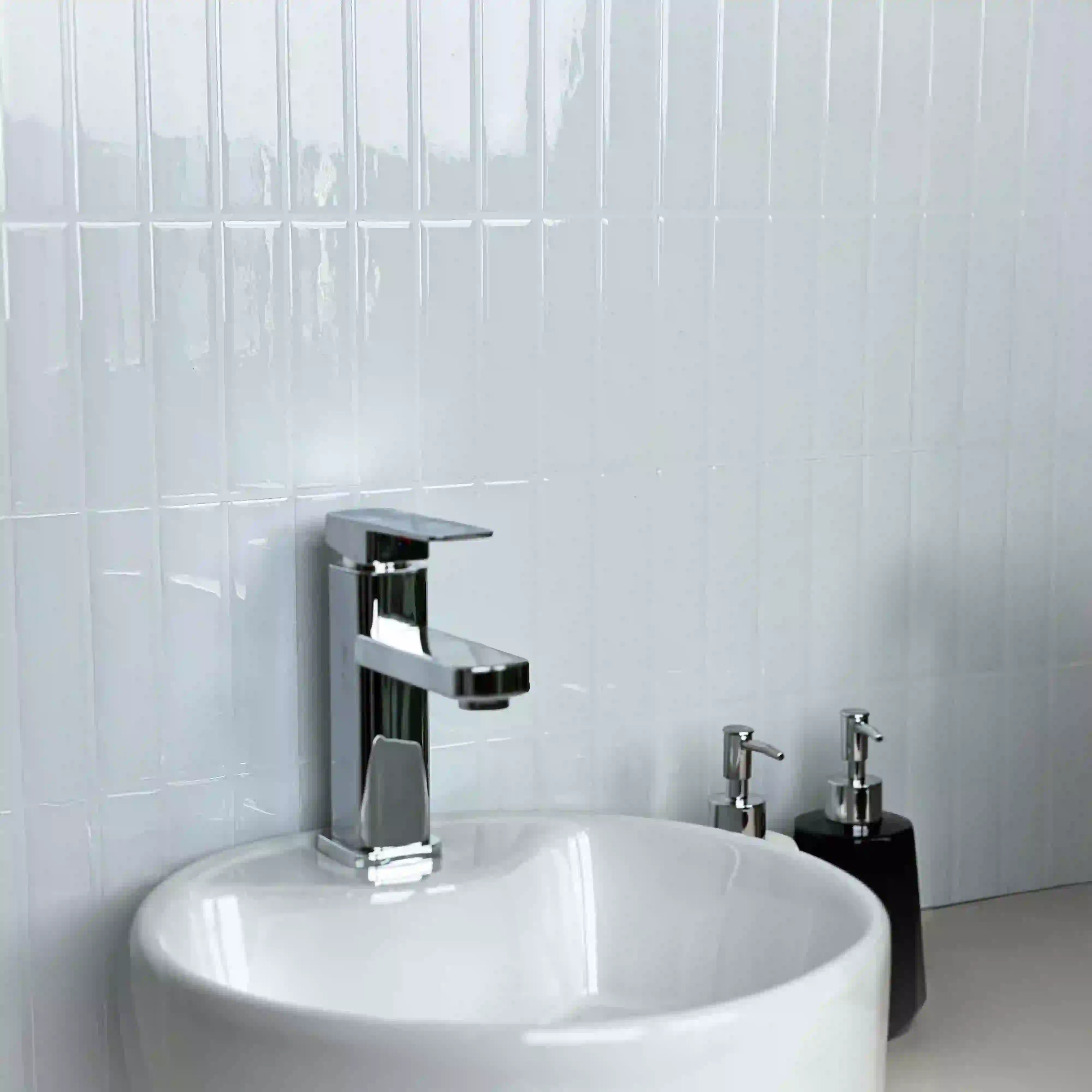 Stickwoll Peel and Stick Moroccan Tiles series displayed in a bathroom setting; featuring Snowy Ceramic Tiles on the wall above a sink, adding a stylish and functional touch to the space