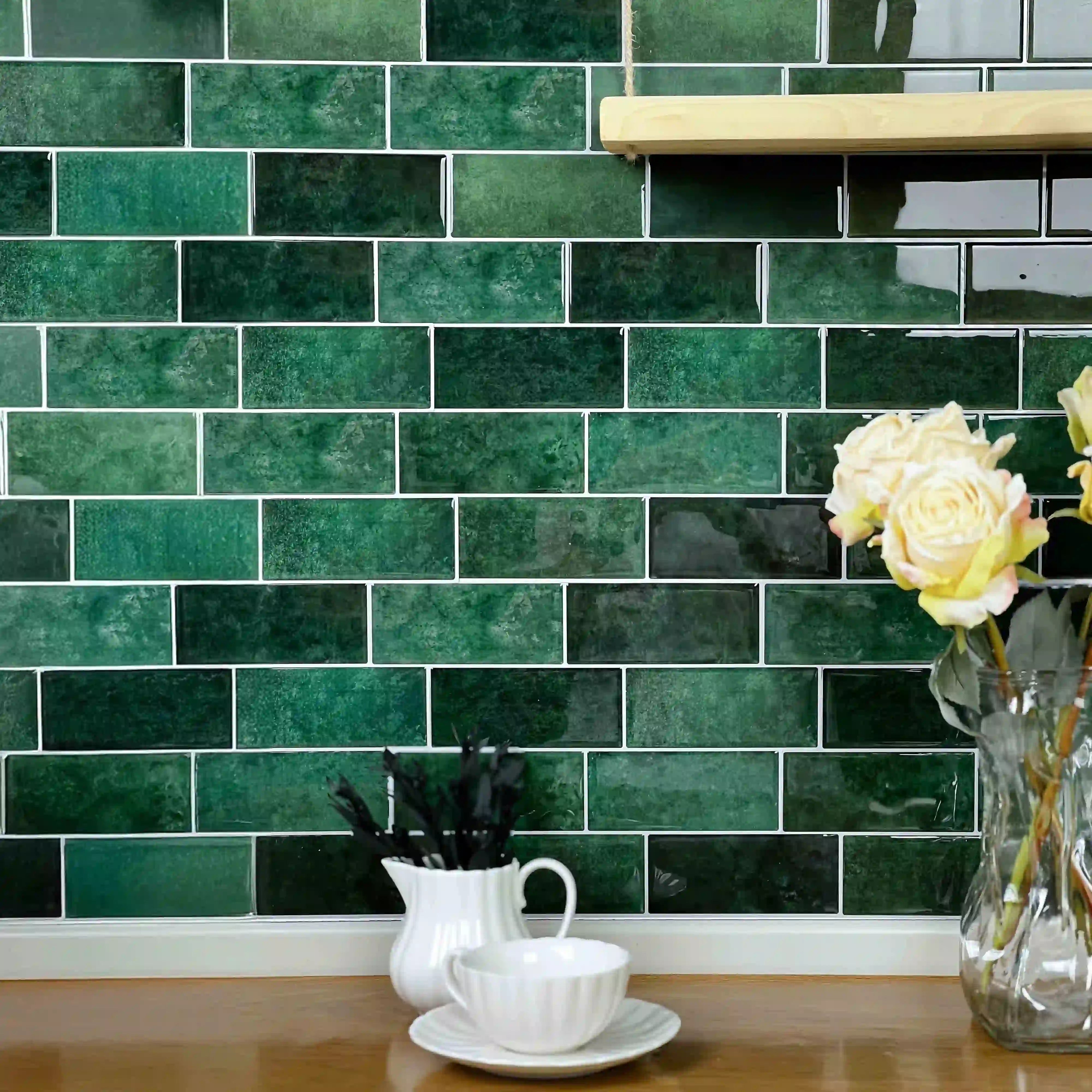 Stickwoll Peel and Stick Subway Wall Tiles series in a modern American kitchen; featuring Leafy Dreams Tiles on the wall, styled with a set of cups and a rose-filled vase for a chic and inviting decor