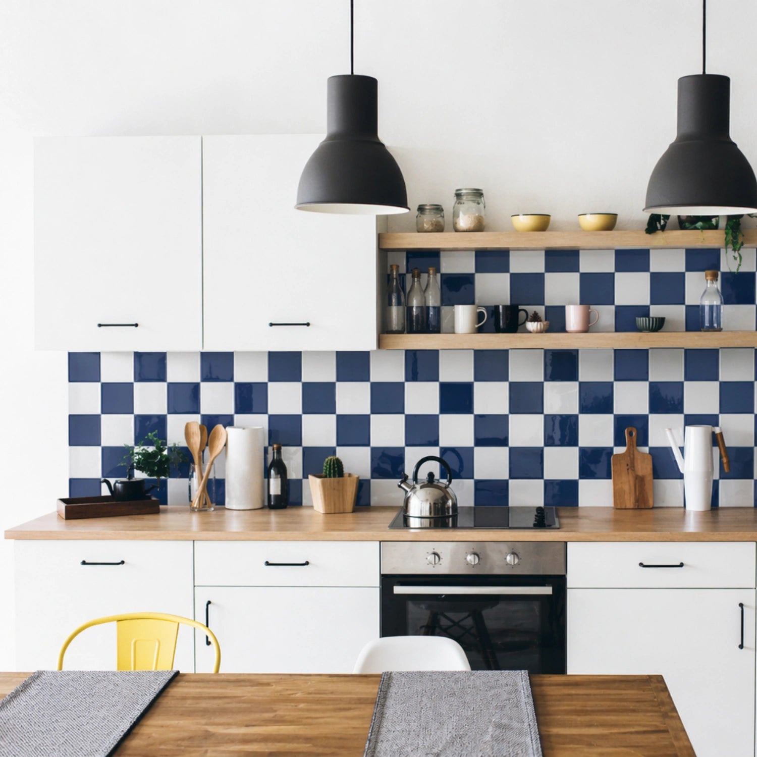 blue and white checkerboard peel and stick tiles kitchen backsplash, Scandinavian kitchen with wood countertop, glossy tile finish, natural daylight