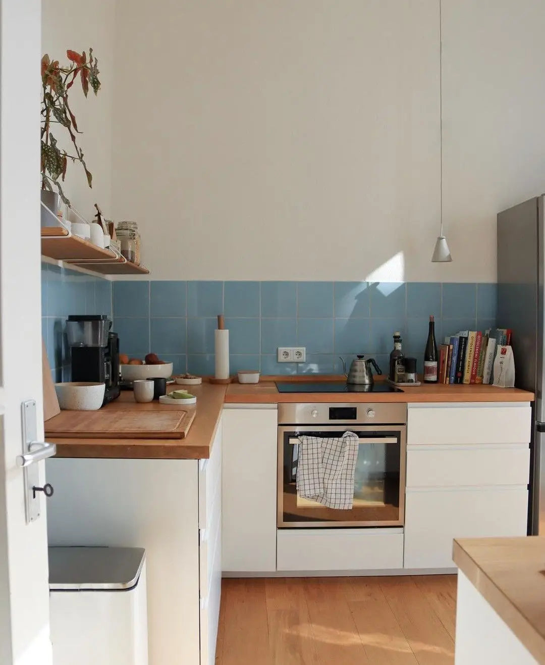 Kitchen before Stickwoll peel and stick tile installation